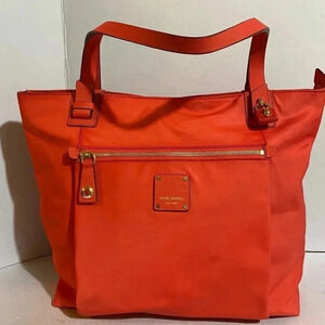 Henri Bendel orange nylon satchel handbag